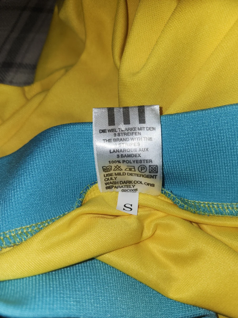 adidas Yellow Soccer Jersey with Blue and Black Stripes and Opel Logo